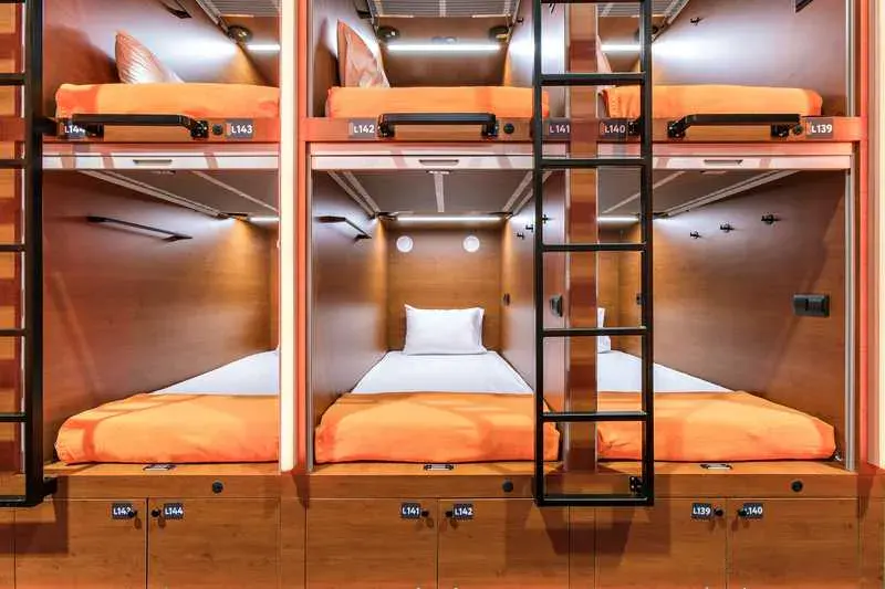 GettSleep single capsule corridor red LED lighting tunnel effect Terminal C Sheremetyevo