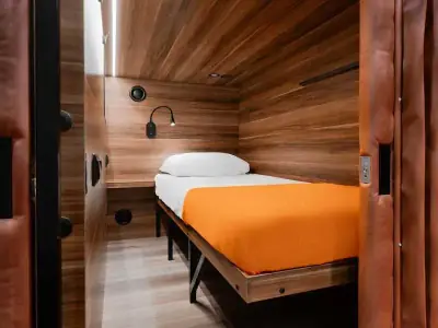 GettSleep Comfort lower capsule orange blanket bed Terminal B Sheremetyevo